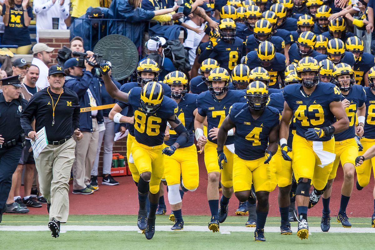 Activision’s Bobby Kotick helps send University of Michigan football
